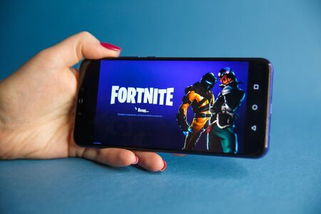 Tula, Russia - JANUARY 27, 2019 - Fortnite video game screen with character and console controller. Fortnight Battle Royale online gaming by Epicのeditorial素材
