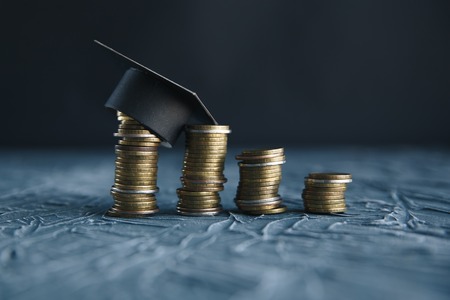 Scholarship money concept. Coins with money stack step growing growth saving money investmentの写真素材