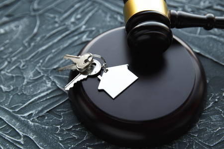 Gavel wooden and house for home buying or selling of bidding or lawyer of home real estate and building concept.の写真素材