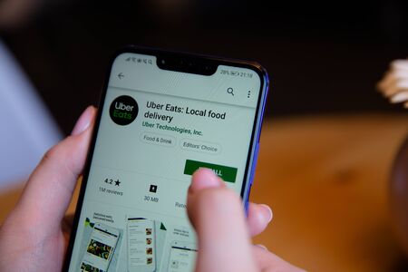 Tula, Russia - March 25, 2019: Uber eats on phone display.