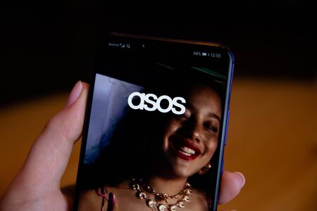 Tula, Russia - March 25, 2019: Asos on phone display.のeditorial素材