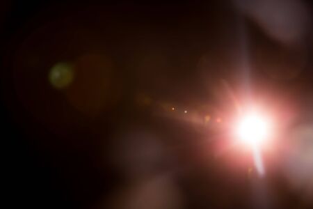 Abstract Natural Sun flare on the black