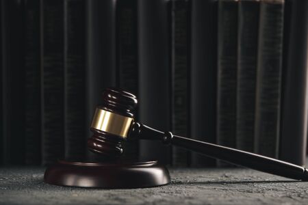 Attorney and notary concept. Wooden gavel on the table.