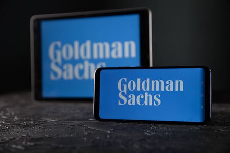 Tula 24 09 2019: Goldman Sachs on the tablet and phone display.のeditorial素材