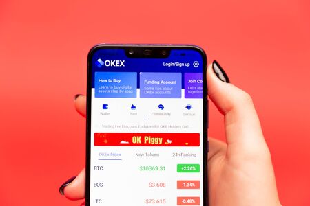 26 08 2019 Tula: Okex on the phone display. Logo