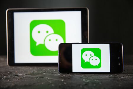 Tula 24 09 2019: WeChat on the tablet and phone display.
