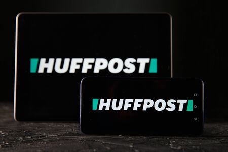 Tula 24 09 2019: HUFFPOST on the tablet and phone display.のeditorial素材