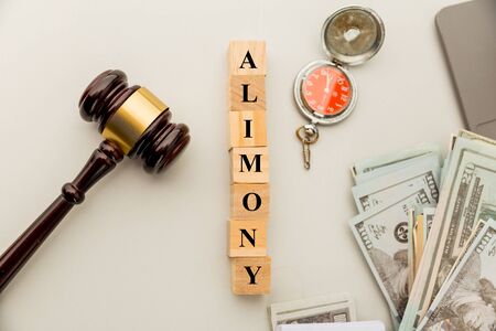 Alimoney document on the tablet and wooden gavel.の写真素材