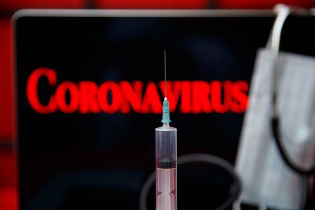 Laptop monitor screen with the warning text corona virus. Chinese virus conceptの写真素材