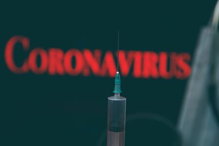 Laptop monitor screen with the warning text coronavirus.の写真素材