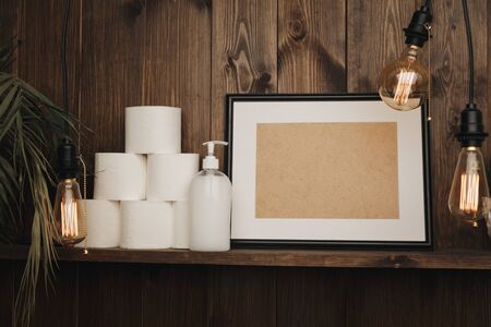 A lot of rolls of toilet paper on the shelf. Covid quarantine concept.