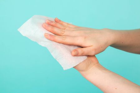 Hygiene concept. Closeup picture of womans hands in a soap and sanitiser.の写真素材