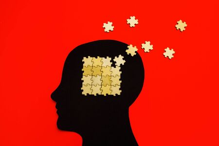 Brain disorder symbol presented by human head made form paper . Creative idea for Alzheimers...