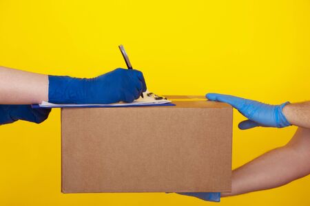 Accepting the order concept. Woman sign document with courier.