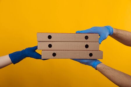 Delivery food concept. Big craft boxes with pizza.の写真素材