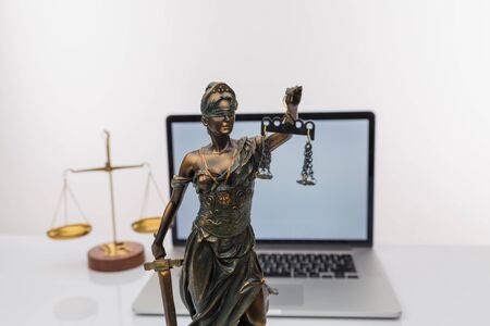 Judge gavel with Justice lawyers having team meeting at law firm background. Concepts of Law and Legal servicesの写真素材