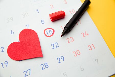 Ovulation date marked on calendar, trying to conceive. Planning of pregnancy conceptの写真素材
