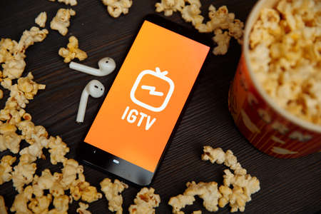 Tula Russia 16.01.20:. IGTV on the phone screen between popcorn.のeditorial素材