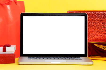 Online Christmas shopping concept on the laptop display. White screen.の写真素材