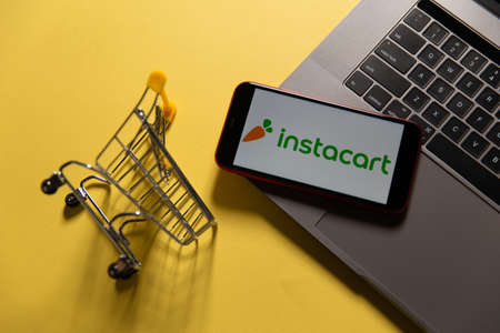 Tula, Russia - November 04, 2020: Instacart logo on iPhone display