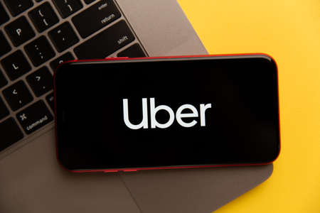 Tula, Russia - November 04, 2020: Uber logo on iPhone display