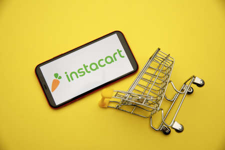 Tula, Russia - January 28, 2020: Instacart logo on iPhone display