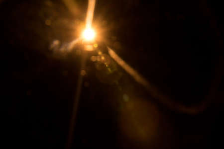 Abstract Natural Sun flare on the black