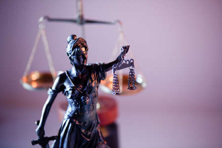 Judgment and law theme. Figure of Lady Justice in notary office