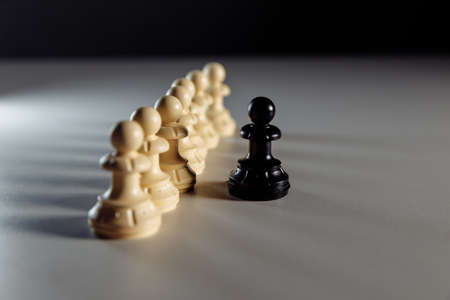 Pawn figures on the table. Leadership conceptの写真素材