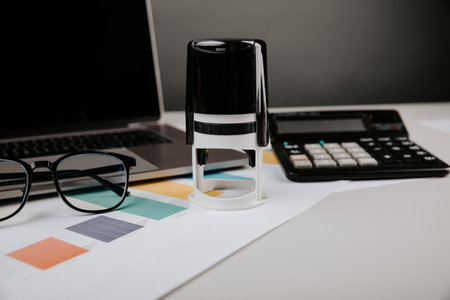 Stamp, charts and calculator. office workplace.の写真素材