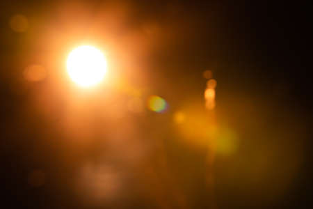 Abstract Natural Sun flare on the blackの写真素材
