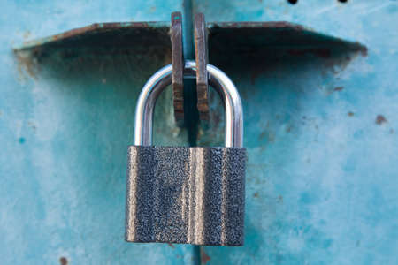 locked door background. The lock on the iron doorの写真素材