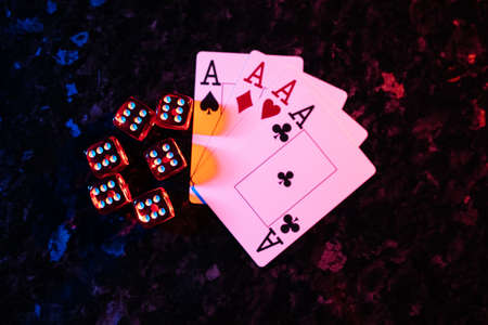 Playing card and game dices on a dark backgroundの写真素材