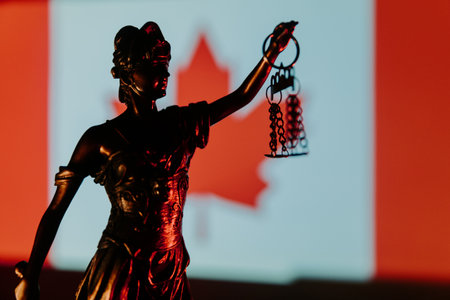 Lady Justice and Canada flag in the backgroundの写真素材