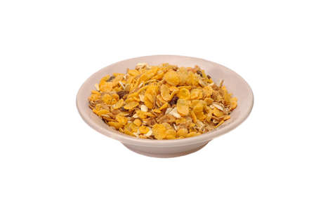 Pile of muesli isolated on white background