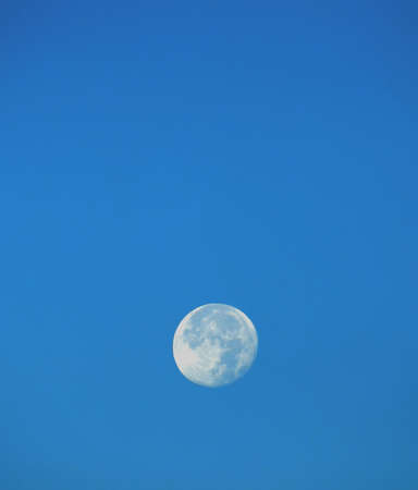 Big moon in the  blue sky.