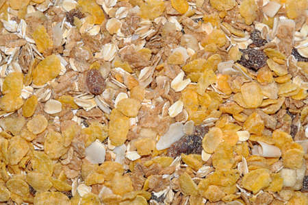 Bran and raisin cereals background, food texture.の写真素材