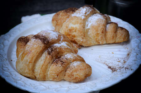 Croissant bread on buffet line.