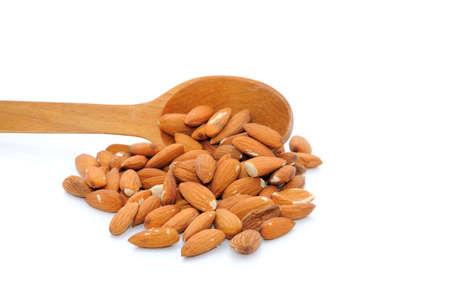 Tasty almonds nuts, isolated on whiteの写真素材