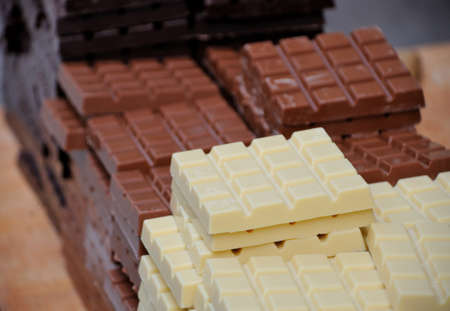 milk, dark and white chocolate barsの写真素材