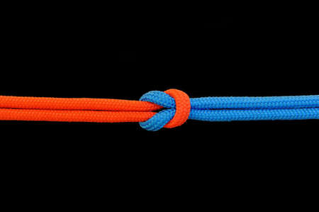 Knot on a cord on a dark backgroundの写真素材