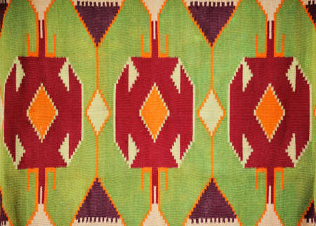 Close up of beautiful colorful hand made motley rug or carpetの写真素材