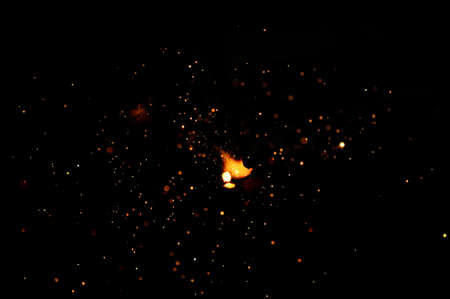 Sparks from welding on a dark background.