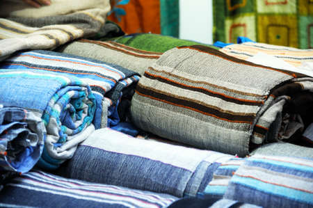 Rolls of colorful fabric as a vibrant background imageの写真素材