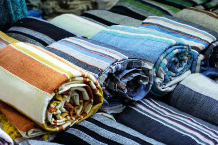 Rolls of colorful fabric as a vibrant background image