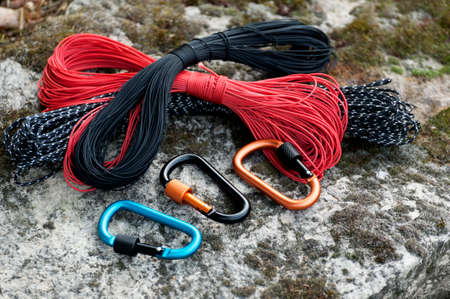 Metal carabine for mountaineering. Photo of colored carabines. Climbing conceptの写真素材