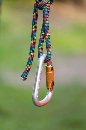 Climbing sports image of a carabiner on a rope . Climbing conceptの写真素材