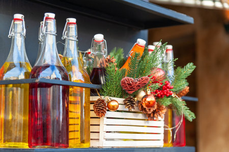 Street decoration with bottles and Christmas tree branches.の写真素材