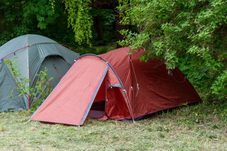 Camping and tent under the forest. Camping tent in a camping in a forest