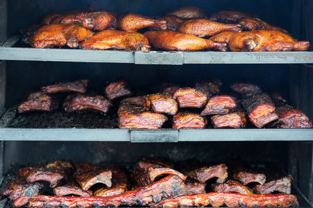 Meat, beef, pork and chicken at street restaurant night marketの写真素材